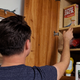 Illustration for article titled Dwindling Kitchen Resources Forcing Man To Scavenge For Food Higher And Higher In Cabinets
